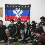 The head of the pro-Russian separatists government Denis Pushilin (3rd L) speaks during a news conference in the regional government building in Donetsk, eastern Ukraine April 18, 2014. Armed pro-Russian separatists in eastern Ukraine said on Friday they were not bound by an international deal ordering them to disarm and would not move out of public buildings they have seized until the Kiev government stepped down. REUTERS/Baz Ratner (UKRAINE - Tags: POLITICS CIVIL UNREST TPX IMAGES OF THE DAY)